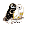 Enamel pin of a black owl representing night cuddling with a white owl representing day