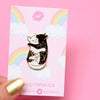 Day and Night Hugging Cats Enamel Pin on packaging